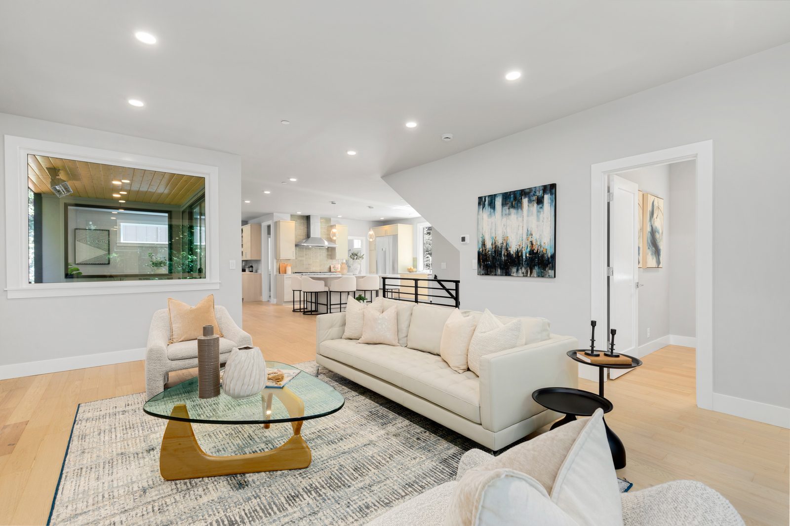 Modern great room connecting effortlessly to the kitchen