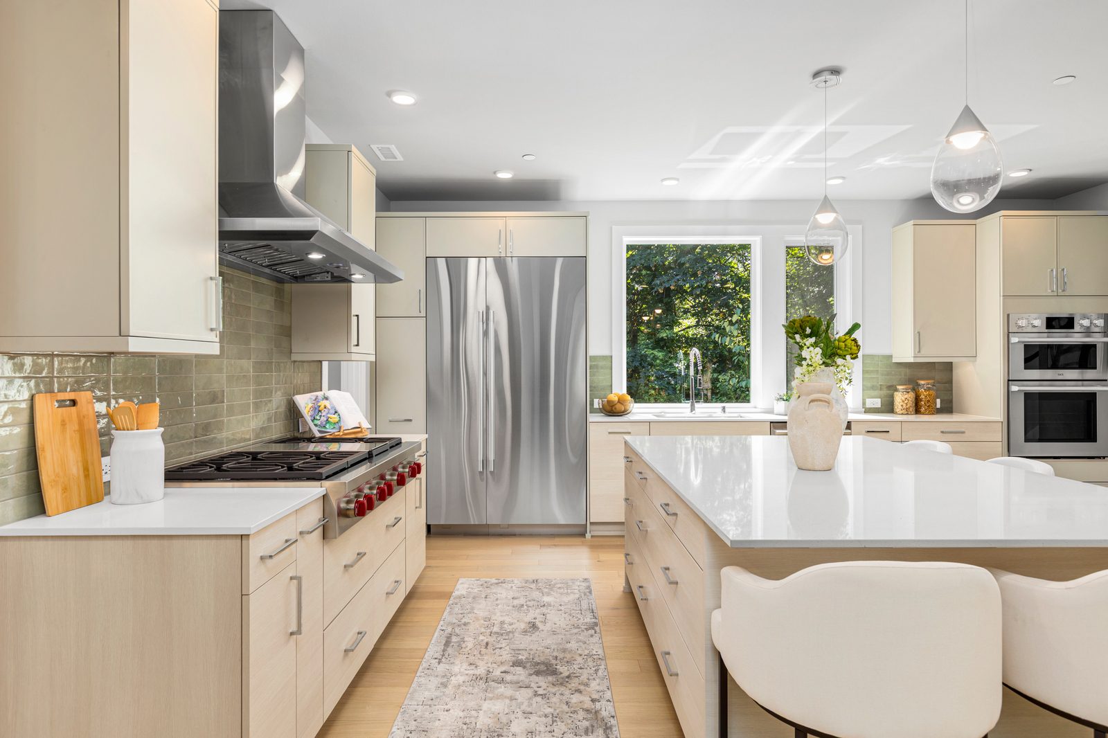 Gourmet kitchen with Wolf & Signature Kitchen Suite Appliances