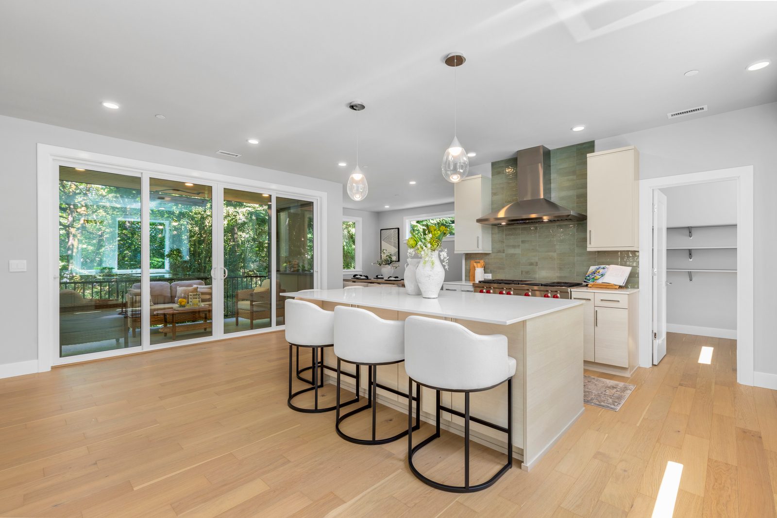 Bright kitchen with easy access to the covered outdoor living area.