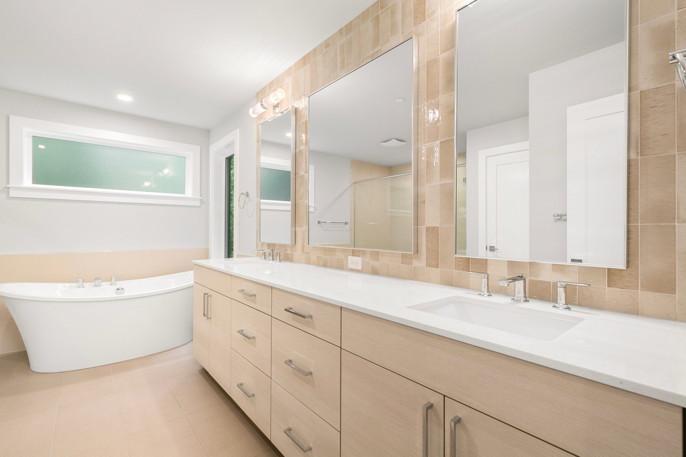 Primary bath featuring a soaking tub