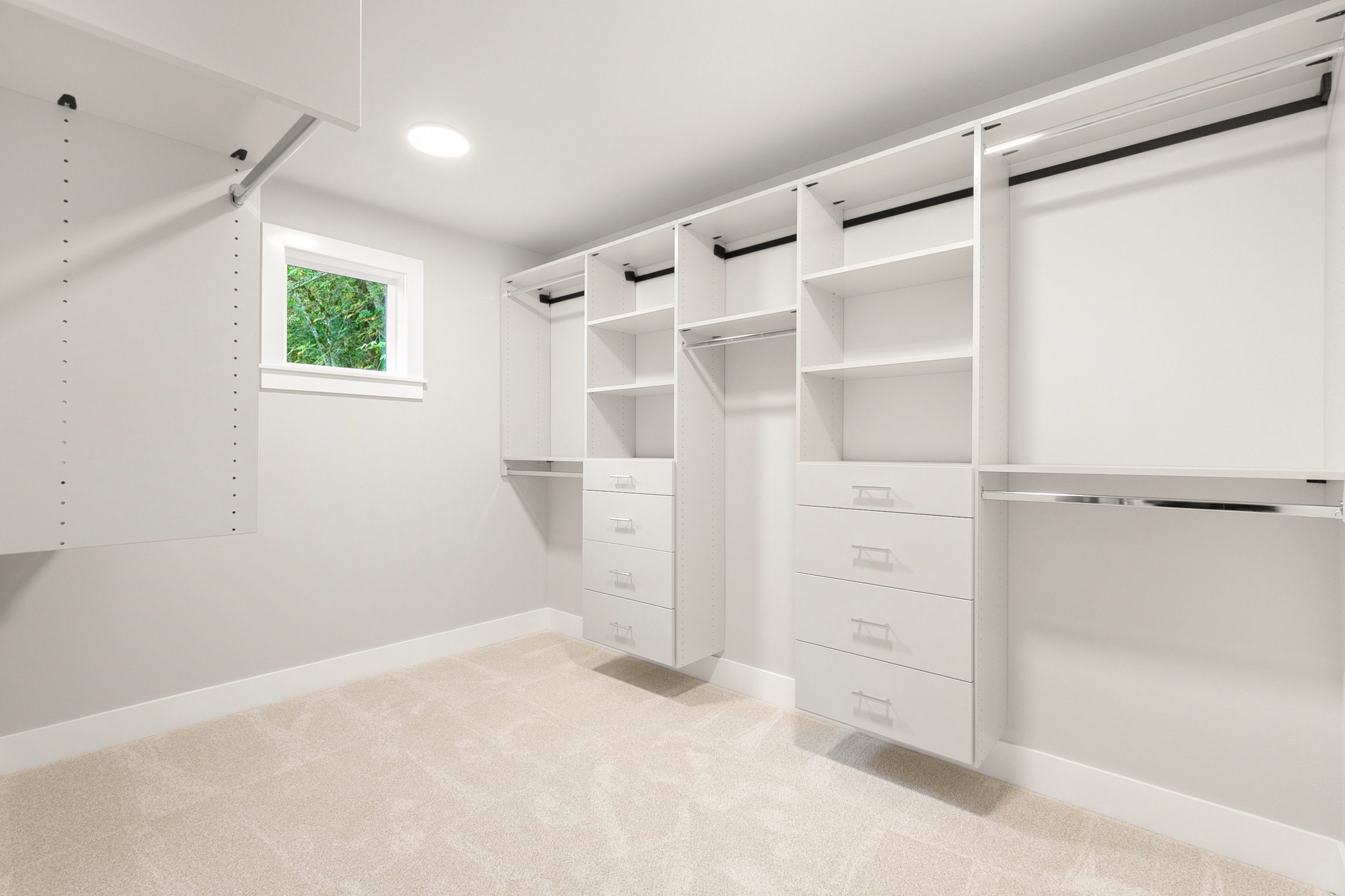 Generous walk-in closet with built-in shelving