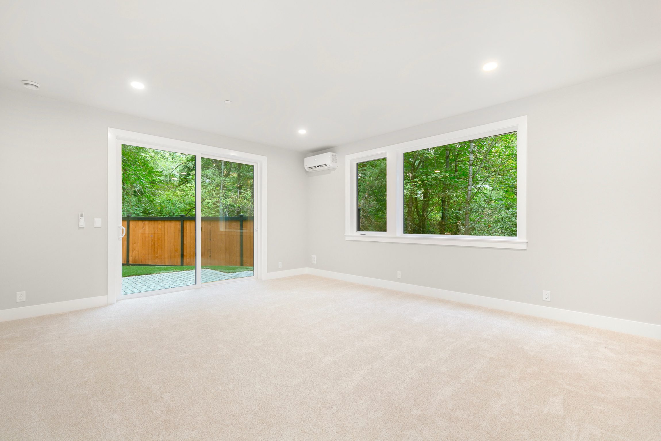 Flexible lower-level living space with backyard access