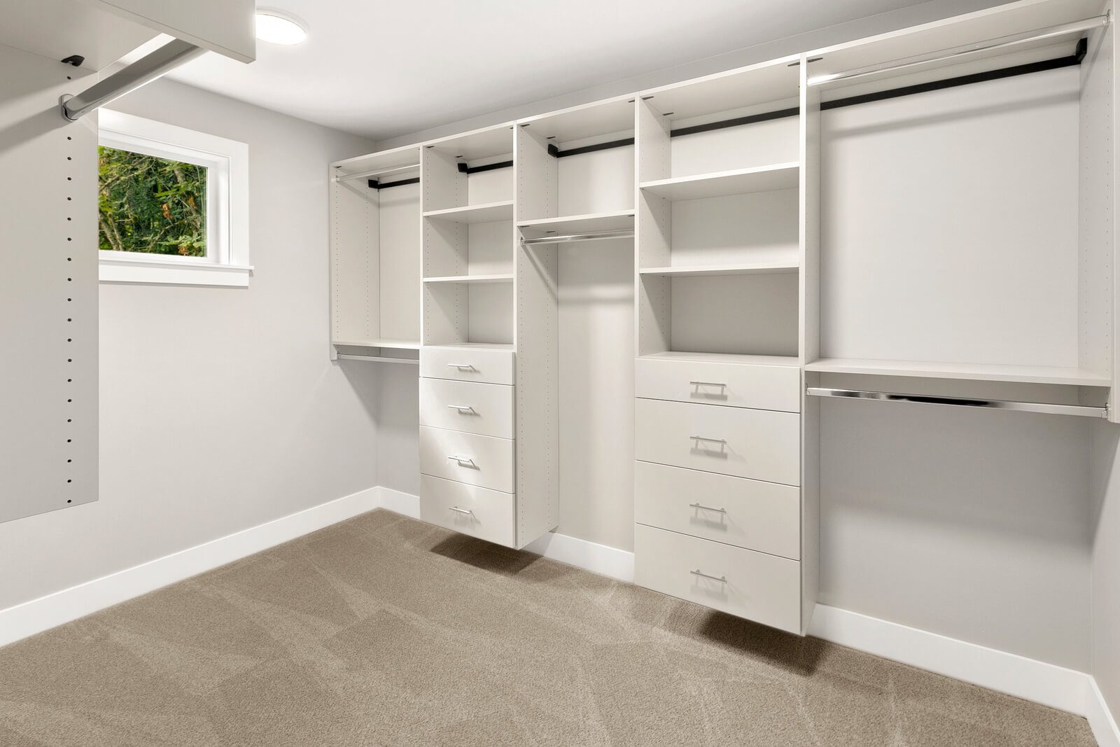 Generous walk-in closet with custom shelving