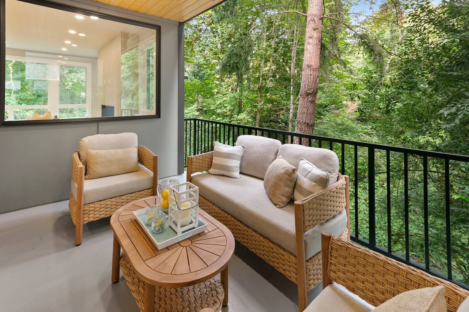 Covered outdoor space opening to a peaceful natural setting